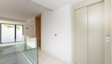 Resa Estates Ibiza for sale newbuilt villa Roca Llisa luxury elevator elevator floor.jpg